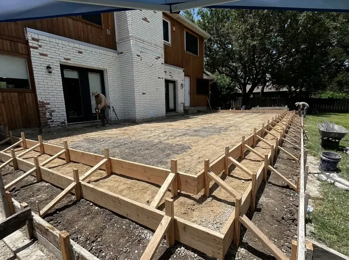 Formed and graded backyard pad before the patio slab was poured